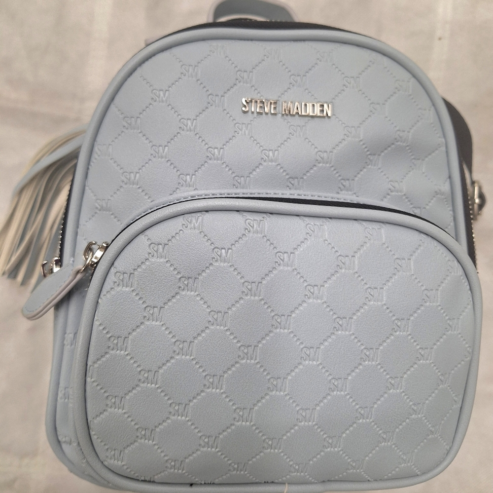Steve Madden BBLOGO Blue Multi Embossed Backpack, With Top Handle.